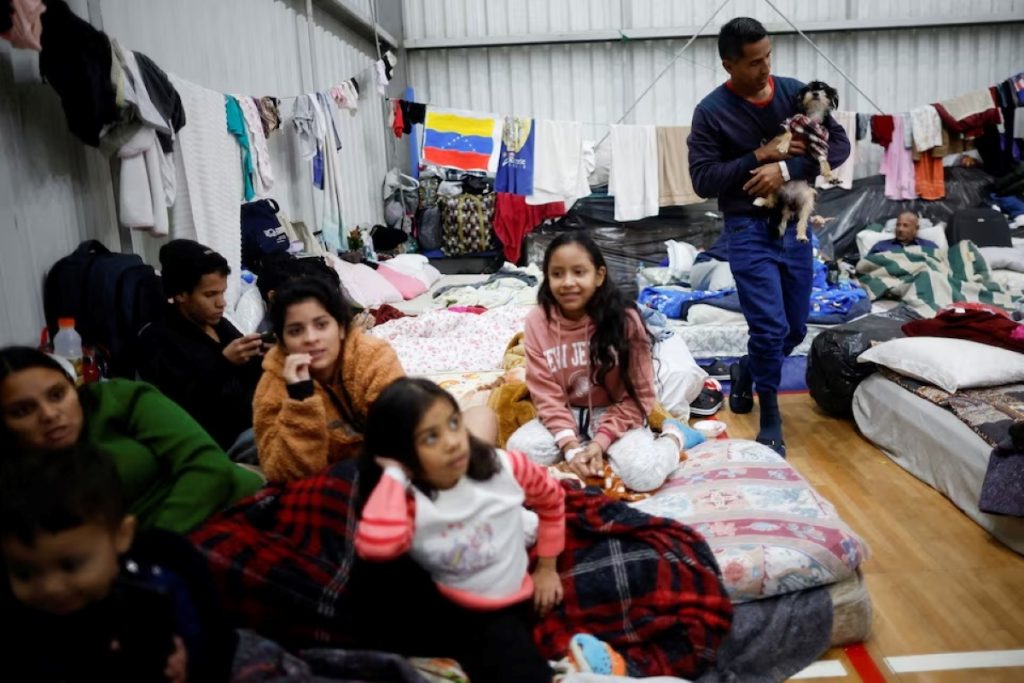 Refugiados haitianos y venezolanos en el sur de Brasil se están viendo obligados una vez más a reconstruir sus vidas tras inundaciones
