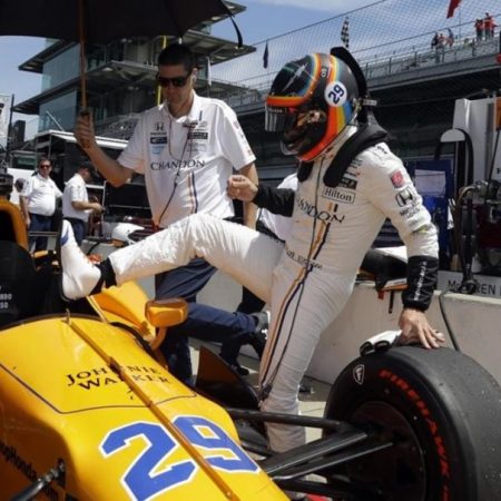 Fernando Alonso  of Spain  climbs into his car during practice for the Indianapolis 500 IndyCar auto race at Indianapolis Motor Speedway  Monday  May 22  2017 in Indianapolis   AP Photo Michael Conroy