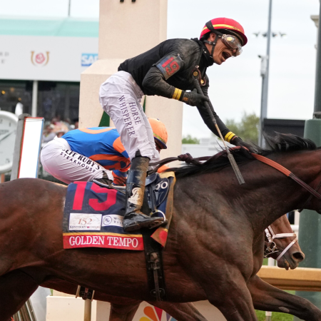 Jockey Jose L. Ortiz celebrates after riding Golden Tempo (19) to victory the 152nd running of the Kentucky Derby horse race at Churchill Downs, Saturday, May 2, 2026, in Louisville, Ky. (AP Photo/Abbie Parr)